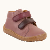 Rosy pink Froddo soft natural leather barefoot first step kids shoes with purple straps, flexible rubber sole zero-drop profile, and a wide toe box