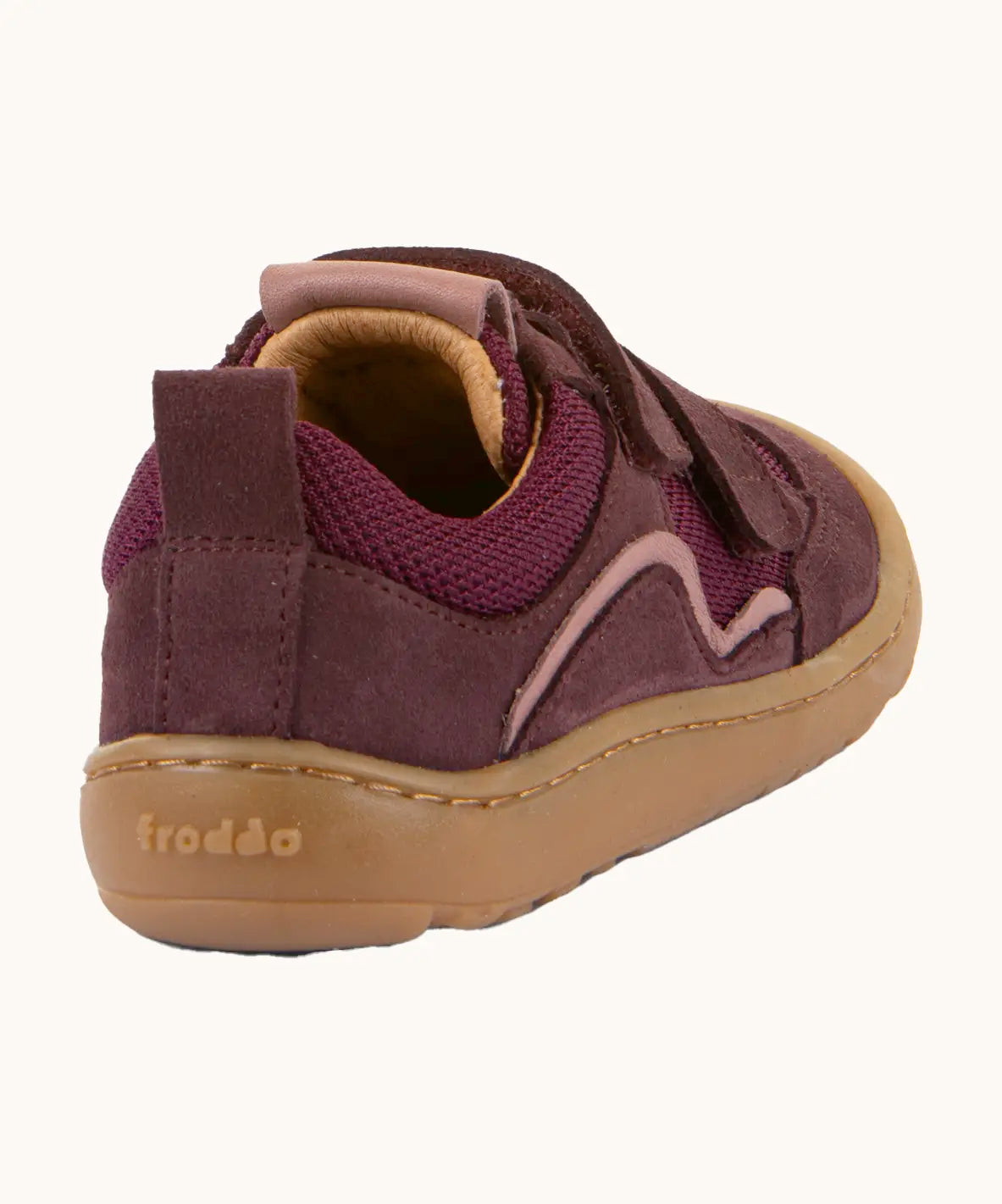 Back of Froddo's maroon barefoot baze kids shoes showing pull tab on the heel. Trainer has a zero heel drop design.