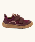 Side of Froddo's maroon barefoot baze kids shoes. Features a brown rubber flexible sole. Trainer has a zero heel drop and wide, foot-shaped design.