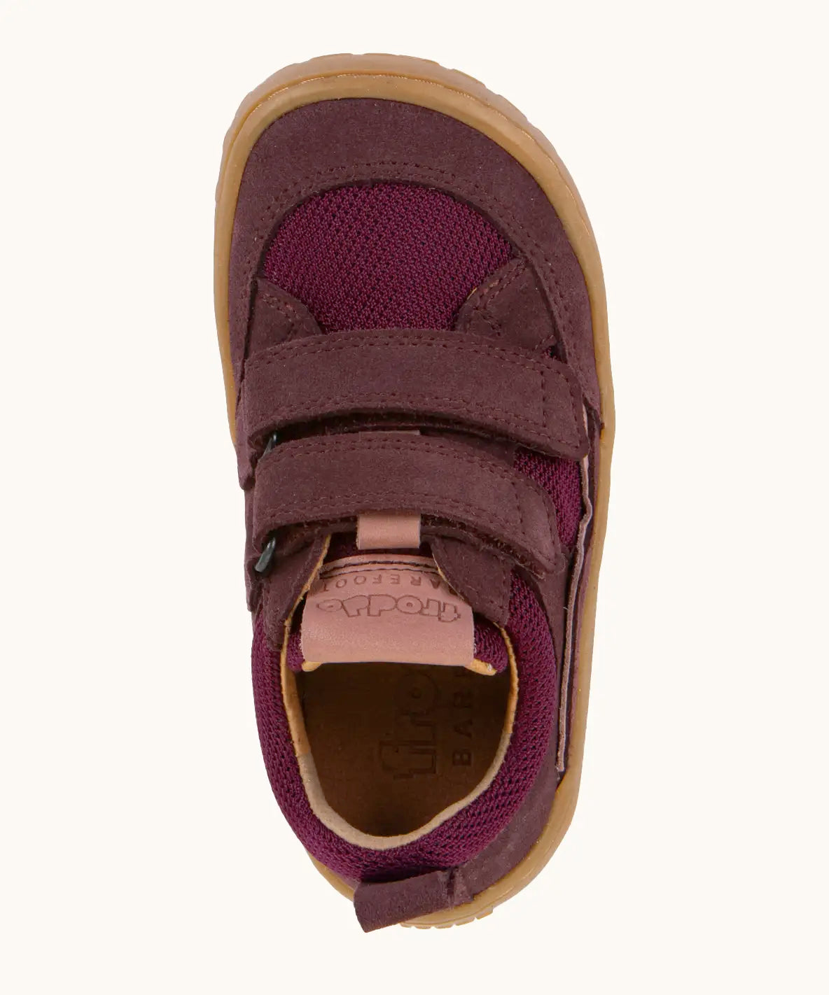Top view of Froddo's maroon barefoot baze kids shoes. Trainer has a wide, foot-shaped design and pull tab on the heel