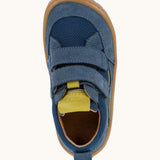 Top view of Froddo's denim blue barefoot baze kids shoes. Trainer has a wide, foot-shaped design and pull tab on the heel