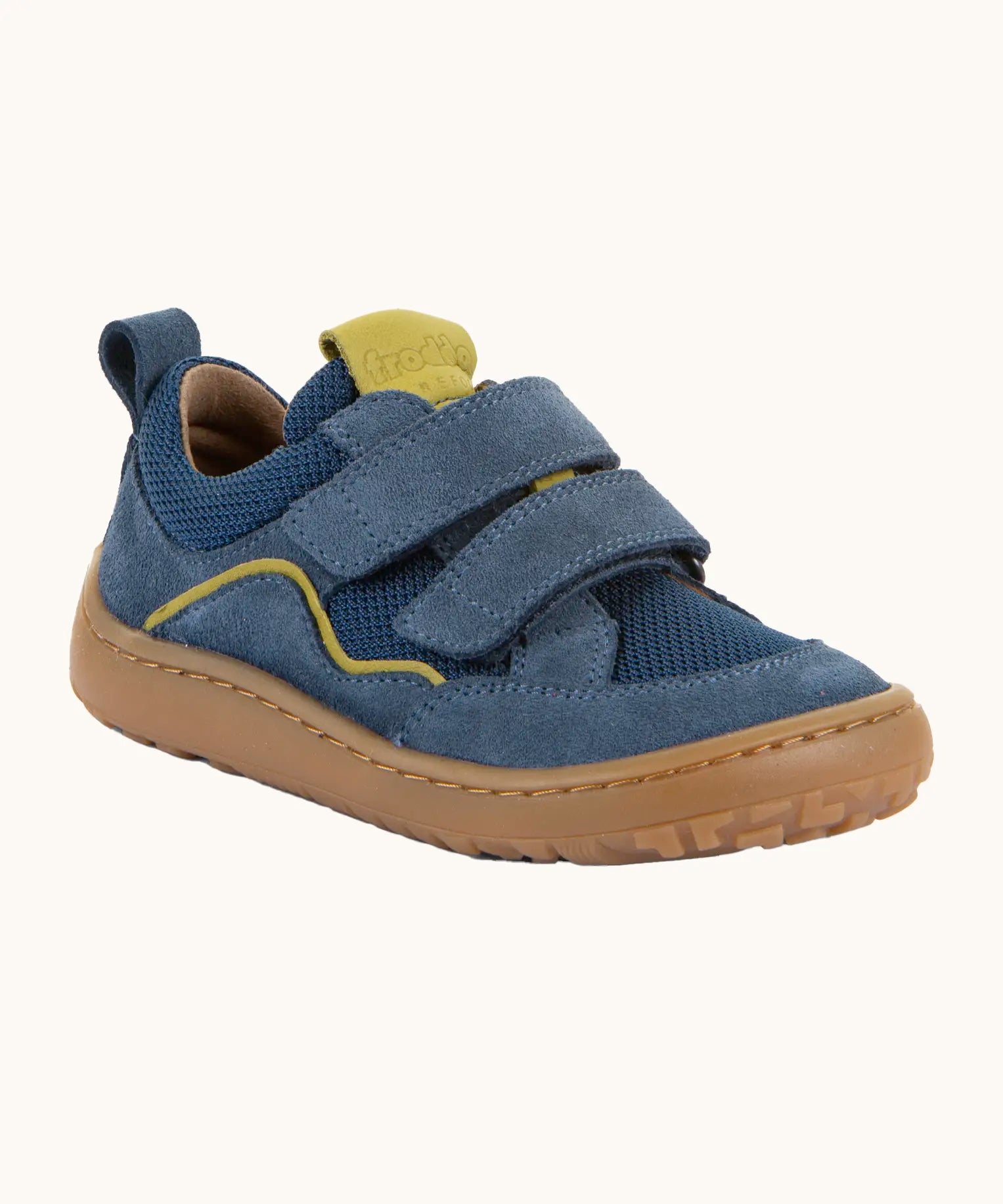 Denim blue Froddo barefoot baze kids shoes. Features velcro straps and a brown flexible sole. Trainer has a zero heel drop and wide, foot-shaped design.