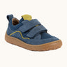 Denim blue Froddo barefoot baze kids shoes. Features velcro straps and a brown flexible sole. Trainer has a zero heel drop and wide, foot-shaped design.