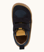 Top view of Froddo's navy blue barefoot baze kids shoes. Trainer has a wide, foot-shaped design and pull tab on the heel