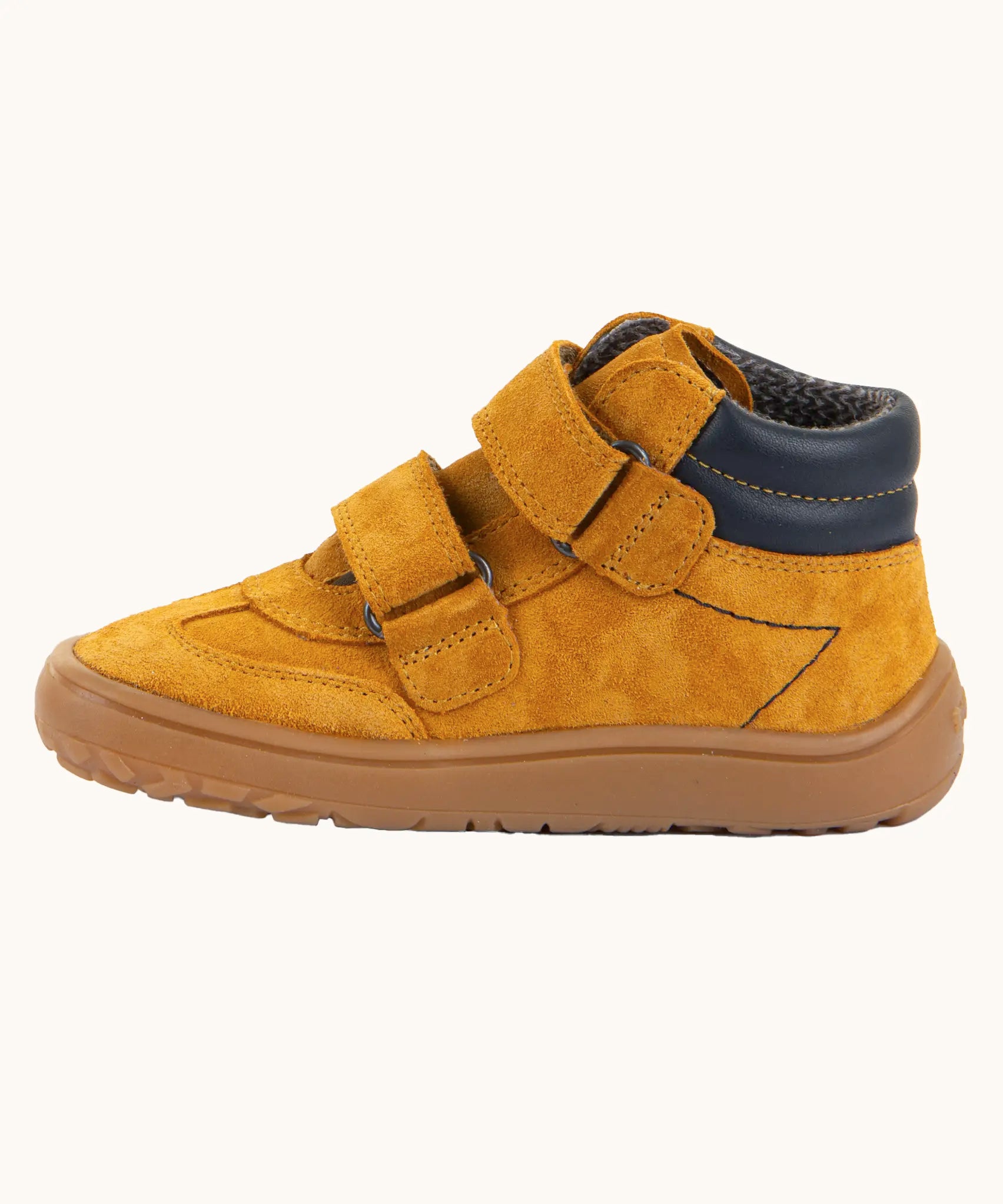 Side of Froddo’s Barefoot Kids F-Motion TEX Shoes in mustard showing the two Velcro straps looped trough the eyelets