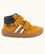 Side of Froddo’s Barefoot Kids F-Motion TEX Shoes in mustard showing the navy padded ankle, white stripes design and brown rubber sole
