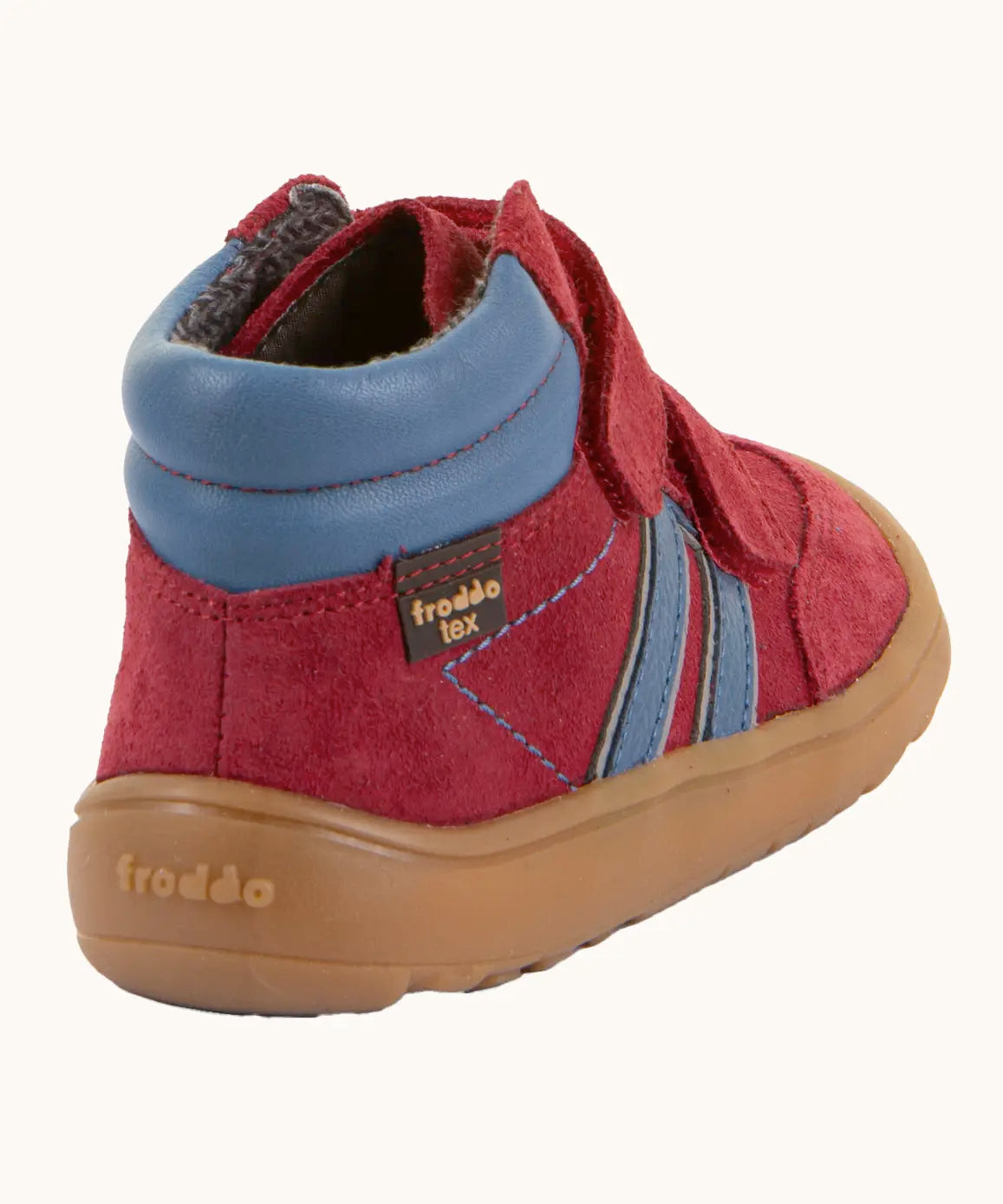 Back of Froddo’s Barefoot Kids F-Motion TEX suede shoes in red showing  the blue padded ankle matching side stripes and brown rubber sole