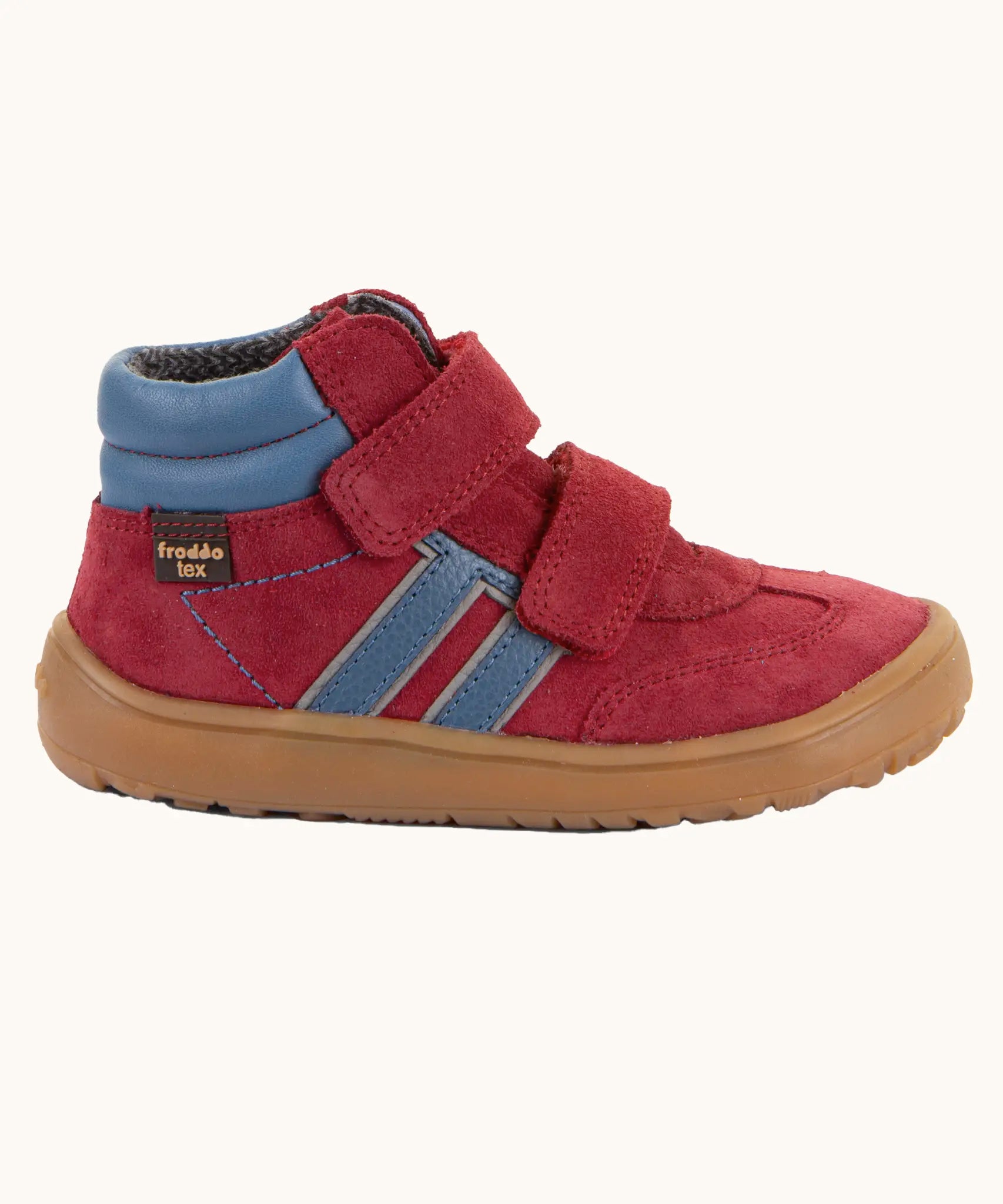 Side of Froddo’s Barefoot Kids F-Motion TEX Shoes in red showing the blue padded ankle matching stripes design and brown rubber sole