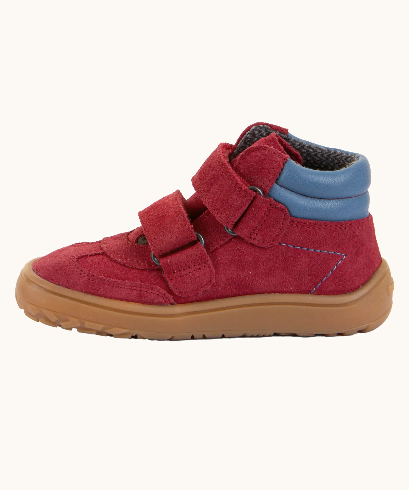 Side of Froddo’s Barefoot Kids F-Motion TEX Shoes in red showing the two Velcro straps looped trough the eyelets and padded ankle detail