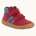 Froddo’s Barefoot Kids F-Motion TEX suede shoes in red. Features a blue padded ankle, two Velcro straps, blue side stripe and brown rubber sole