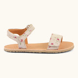 Side of Froddo barefoot kids natural leather sandal in pink with flowers. Showing both straps fastened and padded ankle support