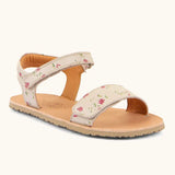 Froddo barefoot kids natural leather sandal in pink with flowers. Showing a velcro strap and buckle fastener on the front