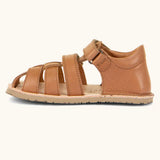 Froddo barefoot natural leather kids flexy sandal in tan brown showing a velcro strap looped through the eyelet