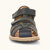 Front of Froddo barefoot kids flexy sandal in dark blue showing the 2 velcro straps and rubber sole