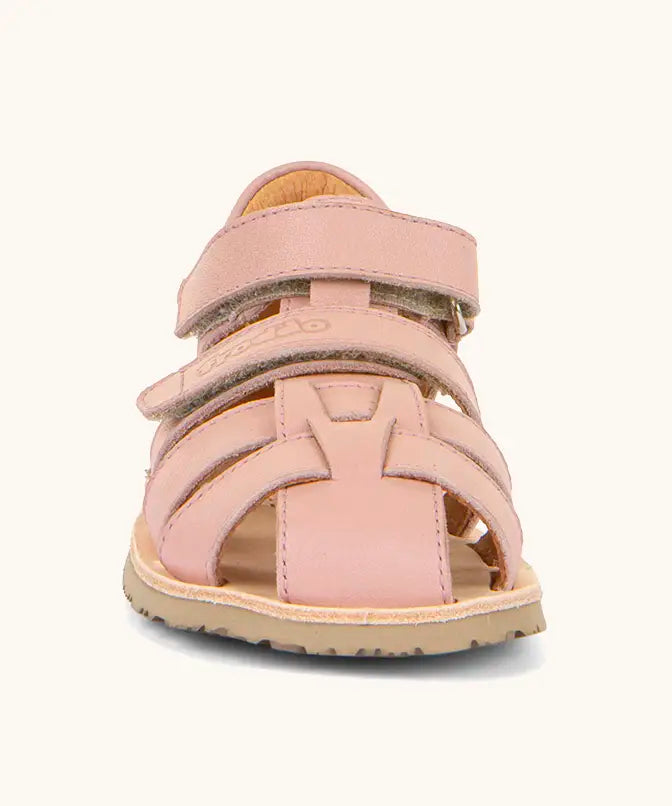 Front of Froddo barefoot kids flexy sandal in pink showing the 2 velcro straps and rubber sole