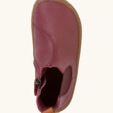 A top view of the Froddo barefoot kids leather chelsea boots in Bordeaux maroon showing the pull tab and insole detail