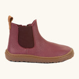 Side of Froddo barefoot kids leather chelsea boots in Bordeaux maroon showing the side elastic and matching brown sole detail