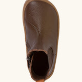 A top view of the Froddo barefoot kids leather chelsea boots in bown showing the pull tab and insole detail