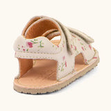 Froddo barefoot kids natural leather sandal in pink with flowers showing the padded ankle support and rubber sole