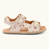 Side of Froddo barefoot kids natural leather sandal in pink with flowers showing the padded ankle support and rubber sole