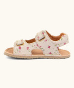 Froddo barefoot kids natural leather sandal in pink with flowers showing the velcro fasteners looped through the eyelets