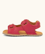 Side of Froddo barefoot kids natural leather sandal in red showing velcro straps looped through the eyelets