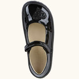 Top view of the Froddo barefoot kids black patent school shoe. A dolly shoe with a velcro fastener and heart decoration on the front