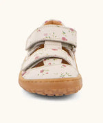 Front of the Froddo barefoot children's sandal in pink with flowers showing 2 velcro fasteners and a brown grippy sole