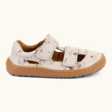 Froddo barefoot natural leather kids sandal in pale pink with flowers showing 2 velcro fasteners and a grippy sole