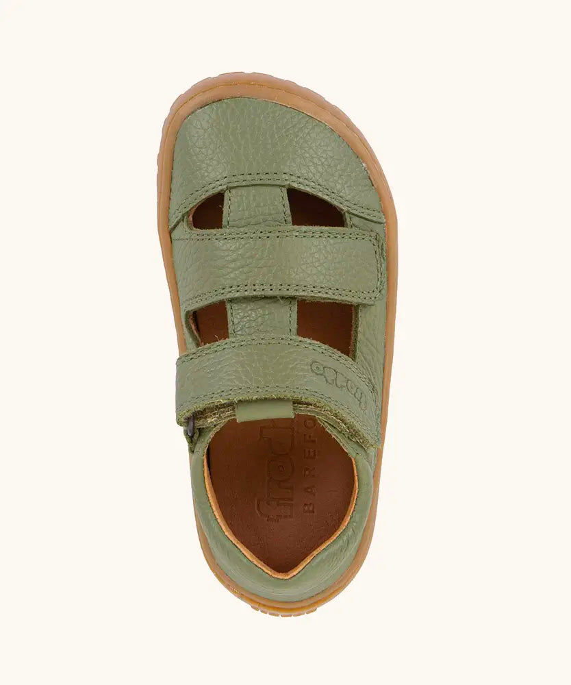 Top view of Froddo barefoot children's sandal in green showing the 2 velcro strap fastener and insole detail