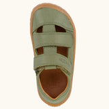 Top view of Froddo barefoot children's sandal in green showing the 2 velcro strap fastener and insole detail