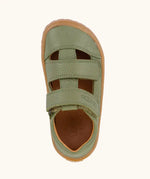Top view of Froddo barefoot children's sandal in green showing the 2 velcro strap fastener and insole detail