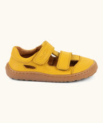 Side of  Froddo's natural leather barefoot children's sandal in yellow showing 2 velcro fasteners and a brown rubber sole
