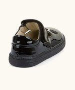 Back of Froddo barefoot kids school shoe in black patent material showing padded ankle support