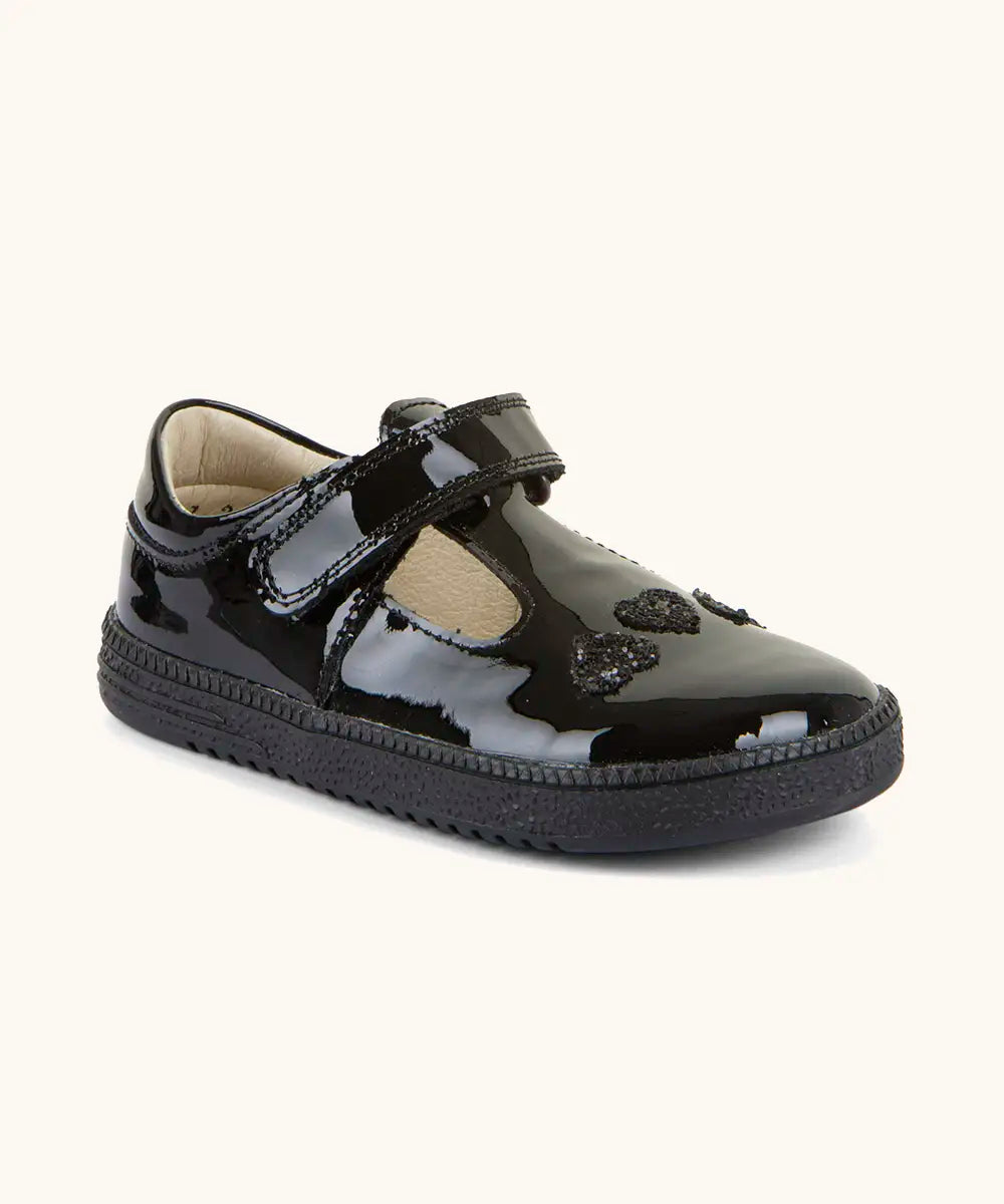 Froddo barefoot kids Sandra school shoe in black patent material with a t-bar velcro fastener and hearts on the front