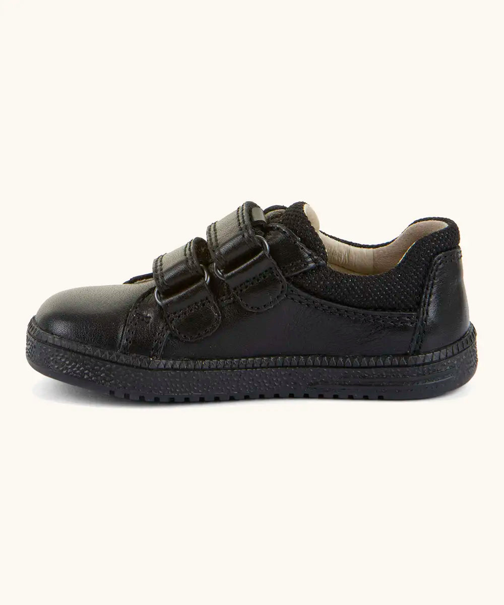 Side of Froddo barefoot natural leather kids Steve school shoe in black with 2 front velcro straps looped through eyelets