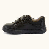 Side of Froddo barefoot natural leather kids Steve school shoe in black with 2 front velcro straps looped through eyelets