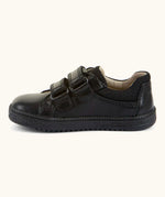 Side of Froddo barefoot natural leather kids Steve school shoe in black with 2 front velcro straps looped through eyelets
