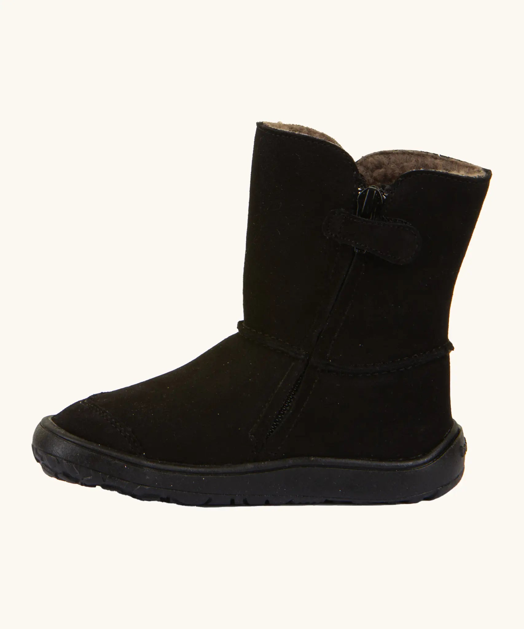 Side of Froddo barefoot kids suede tex boots in black showing the zip fastener detail