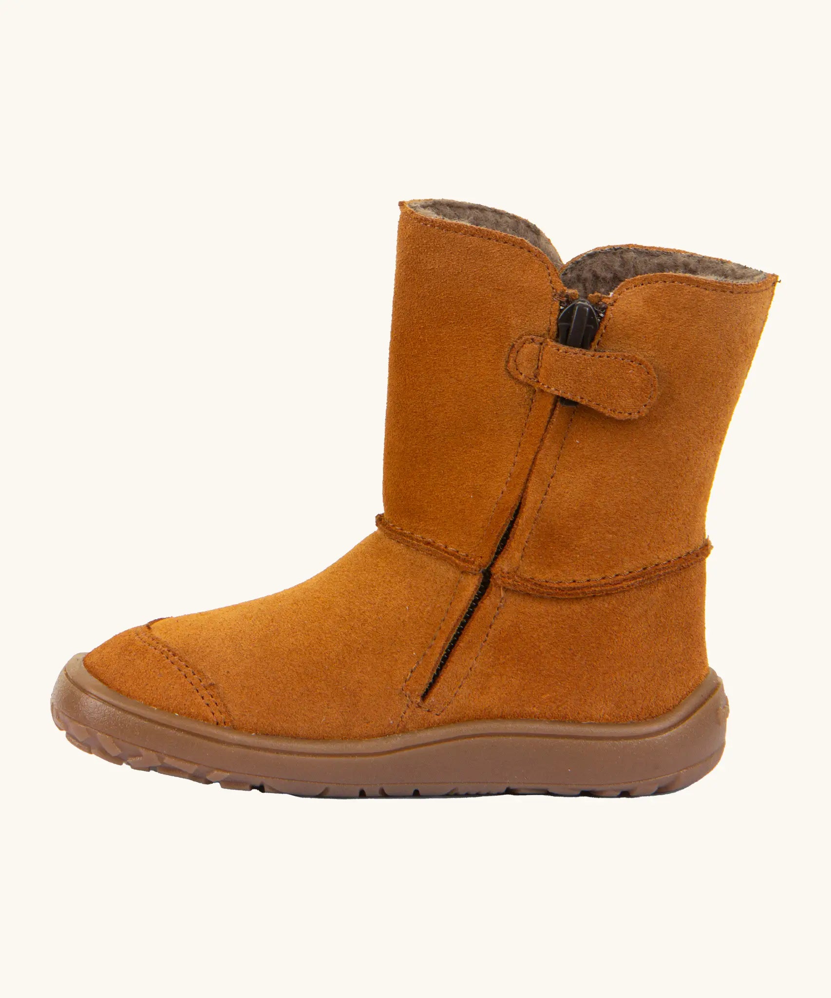 Side of Froddo barefoot kids suede tex boots in rusty brown showing black zip fastener detail
