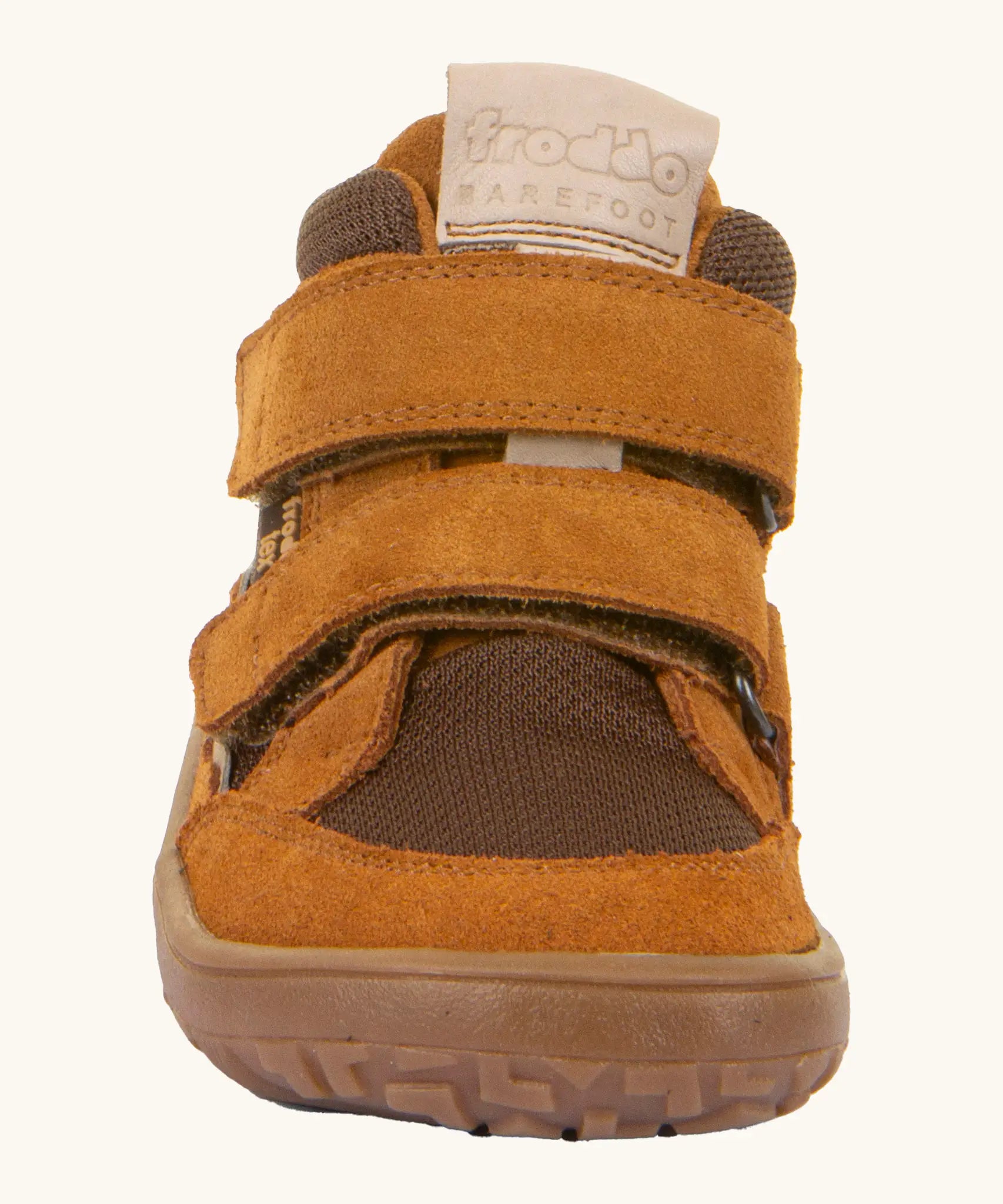 Front of the rusty brown Froddo barefoot kids TEX suede shoes with grippy sole. Shoes have a universal fit 