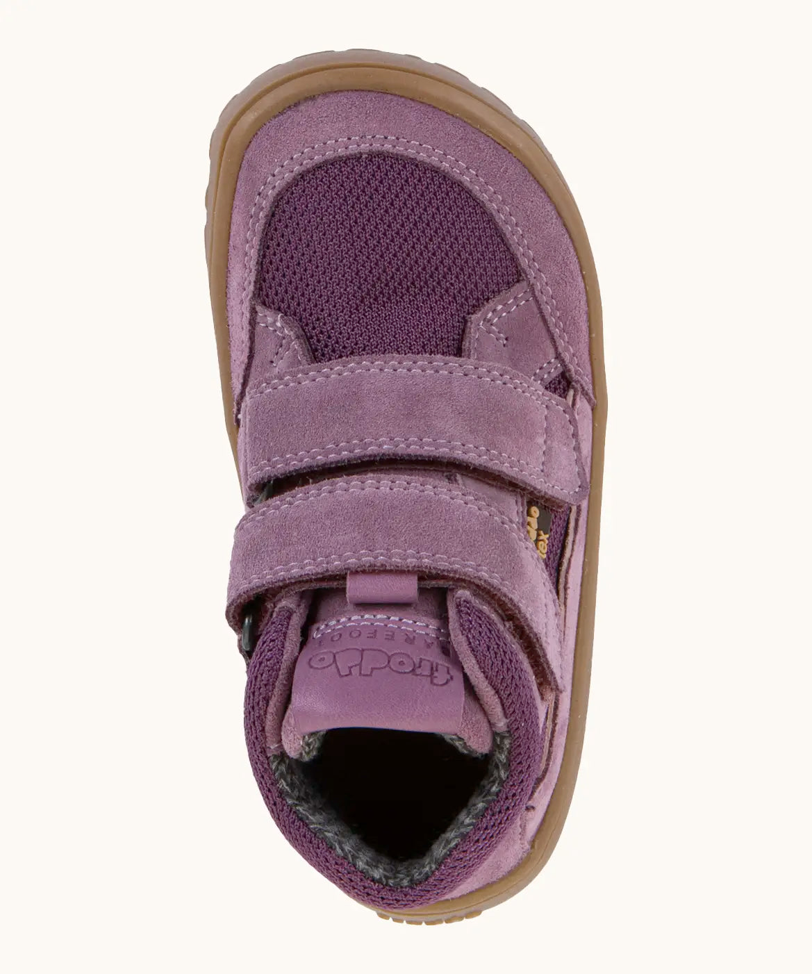 Top view of the grape purple Froddo barefoot kids TEX suede shoes with two velcro straps. Shoes have a universal fit 