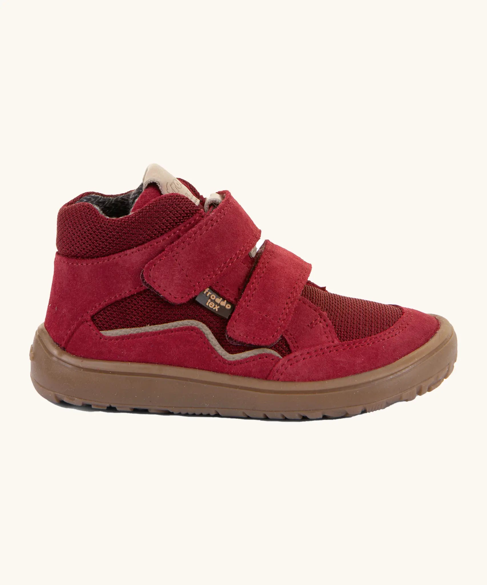 Side of the red Froddo barefoot kids TEX suede shoes with zero drop brown grippy sole and velcro straps