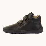 Froddo barefoot leather school boots in black available at Babipur. Showing the veclro strap detail trough the loops. 