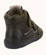 Back of Froddo barefoot tex kids autumn natural leather ankle school boots in black showing padded ankle and textile inner lining