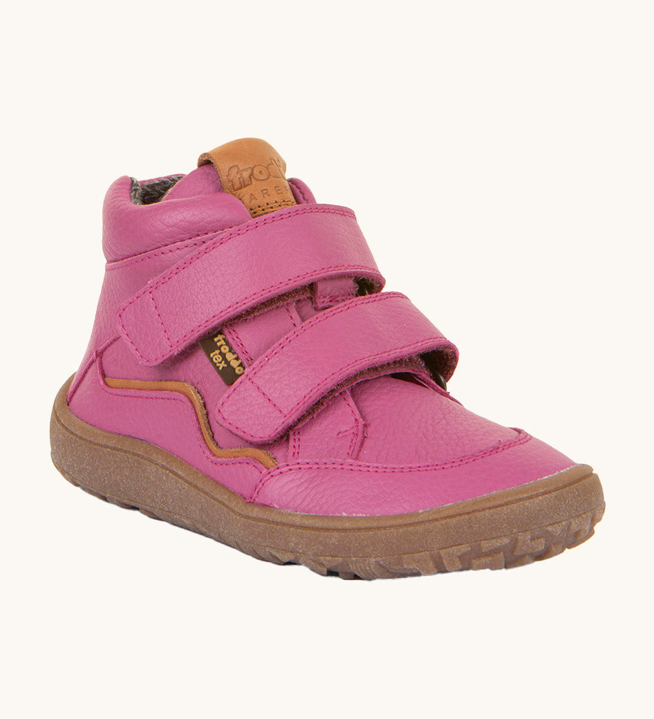 Froddo barefoot Autumn children's shoe in fuschia pink available at Babipur. A natural leather shoe with a 2 velcro fastener for a secure fit, padded ankle and a dark brown grippy sole