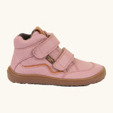 Side of Froddo barefoot tex kids autumn natural leather ankle boots in pink showing Velcro straps fully fastened and brown flexible rubber sole