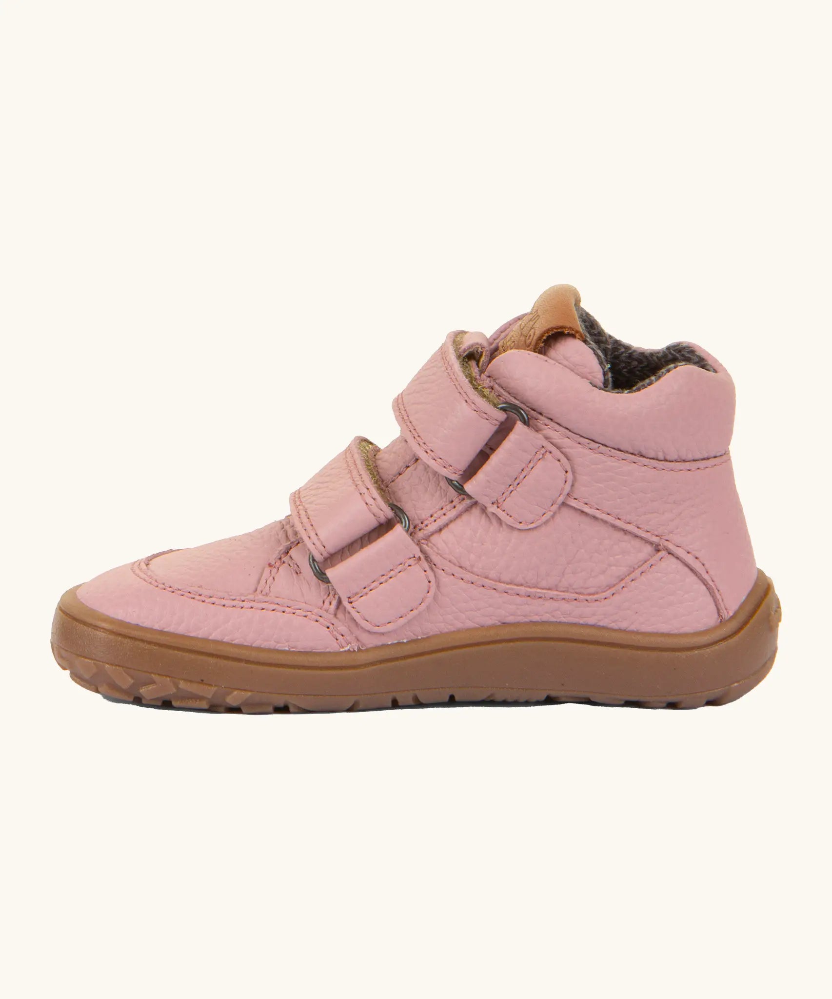 Side of Froddo barefoot tex kids autumn natural leather ankle boot in pink showing Velcro straps looped through the metal eyelets