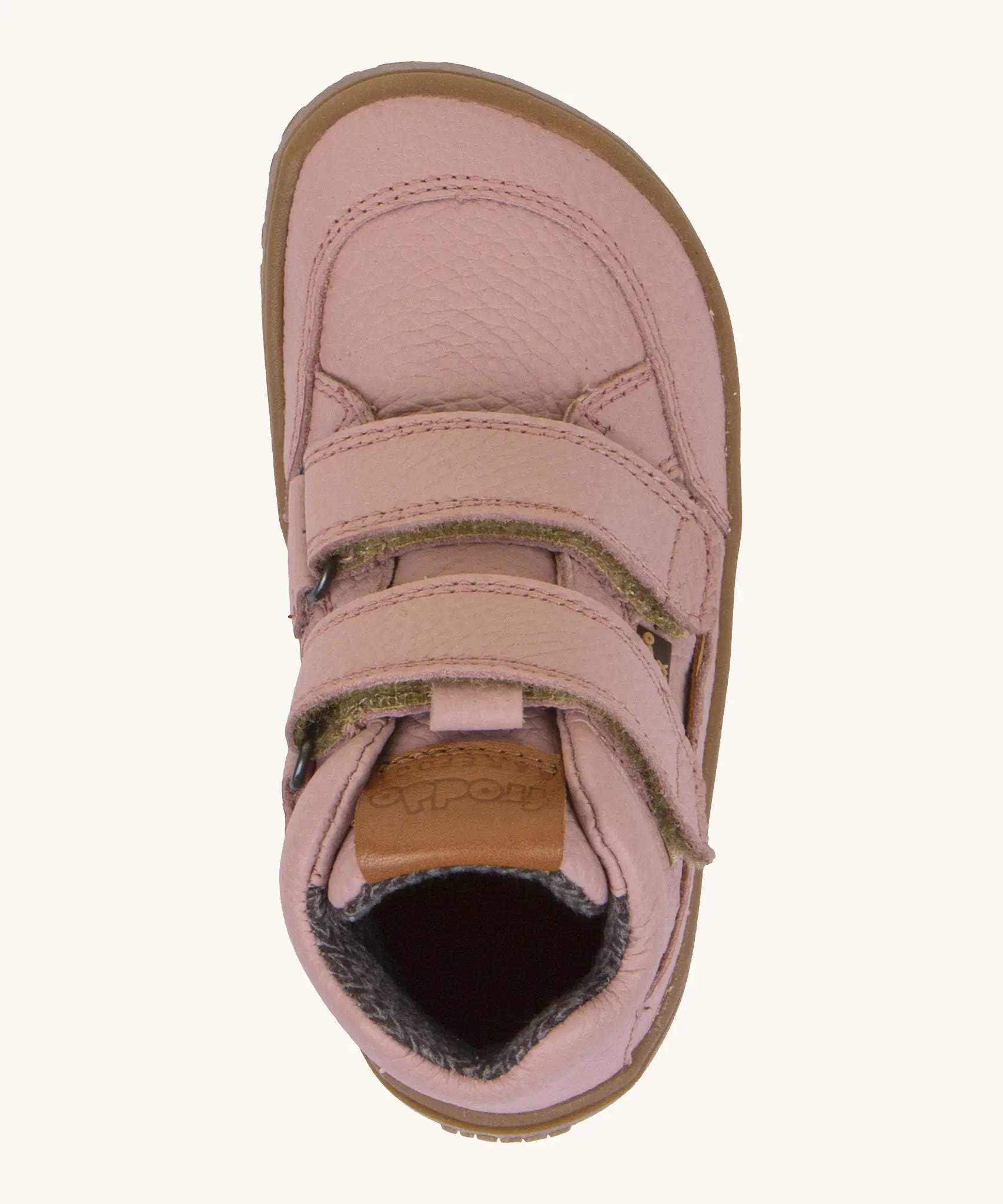 Top of Froddo barefoot tex kids autumn natural leather ankle boots in pink showing Velcro straps fully fastened 