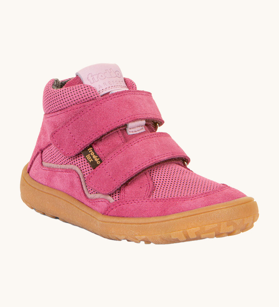 Froddo barefoot tex kids spring shoes in fuchsia available at Babipur. A soft ankle high shoe in pink with a light brown rubber sole. Features two velcro straps for a secure fit 